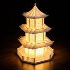 Jade Pavilion 3D printed table lamp (40 cm) glowing warmly at night
